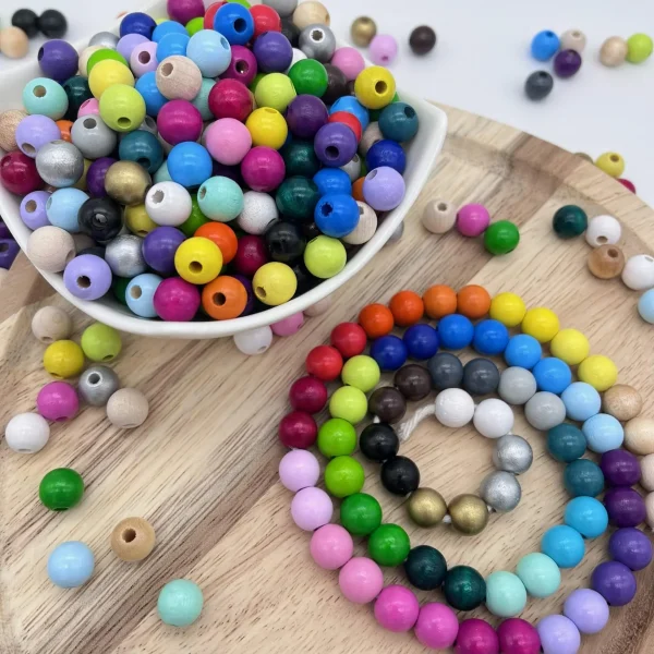 Perles de bois 10 mm • 50 pièces — Kiki-Ena Matériel de bricolage Bois naturel