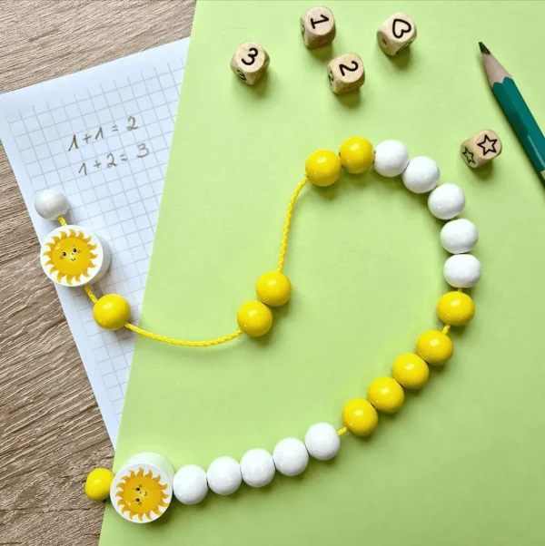 Kit de bricolage - Chaîne à compter "Soleil" en perles de bois — Kiki-Ena Loisirs Créatifs Bois Naturel