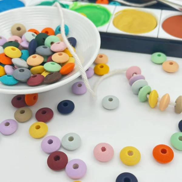 Watercolors Perles Lentilles Bois 10 mm • 50 pièces — Kiki-Ena Matériel créatif Bois naturel